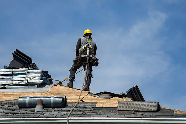 Professional Roof Replacement technician working in Slocum, RI